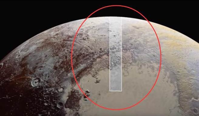 圖片顯示冥王星有一些經(jīng)過(guò)改造的痕跡。(圖/科技訊)