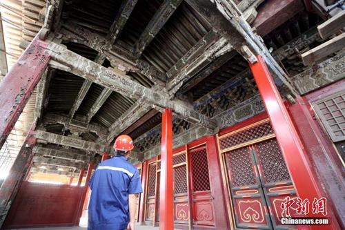 9月3日，北京故宮養(yǎng)心殿修繕項(xiàng)目現(xiàn)場(chǎng)。中新社記者 張宇 攝