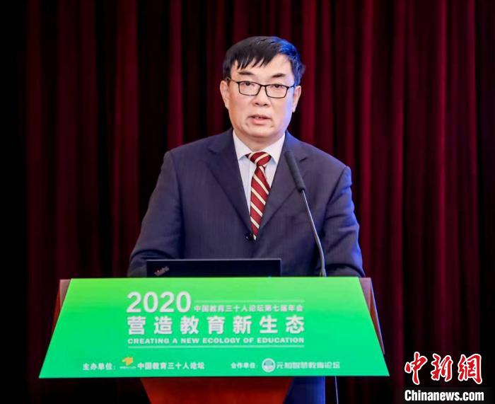 北京金融街潤澤學(xué)?？傂ｉL劉長銘作報告。王賽英 攝