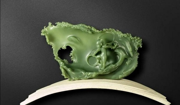 哪吒鬧海——將一塊形制不整的玉料，化變神奇設(shè)計之妙極為稀有.jpg
